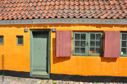 Canvas Print Old yellow house in old town of Copenhagen, Denmark