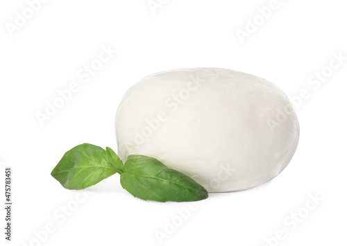 Delicious mozzarella cheese ball and basil on white background