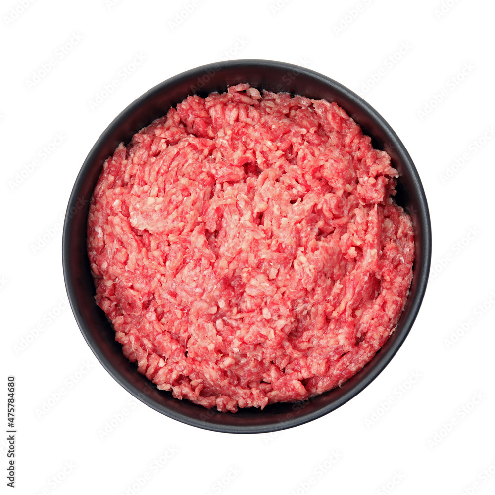 Fresh minced meat in bowl on white background, top view Fresh minced meat in bowl on white background, top view