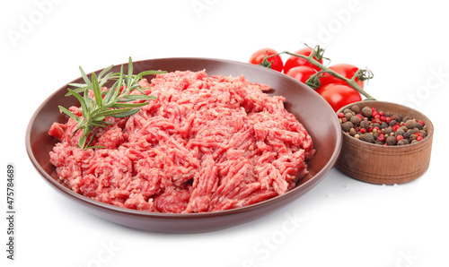 Fresh minced meat and other ingredients on white background