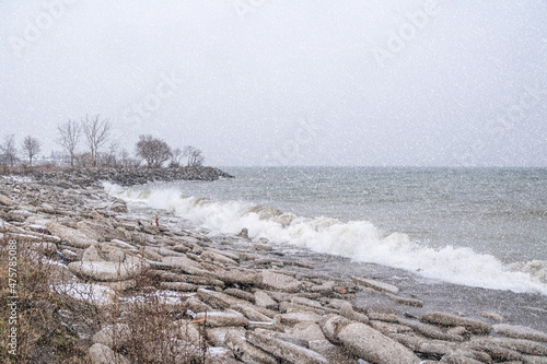Waves pummel the shoreline in Colonel Samuel Smith Park in Etobicoke (Toronto), Ontario during a winter snowstorm.