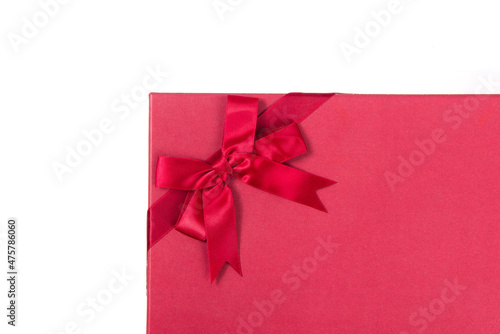 red gift box with satin bow isolated on white background