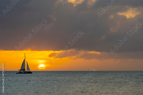 The Sun Sets On The Atlantic Ocean In The Florida Keys photo