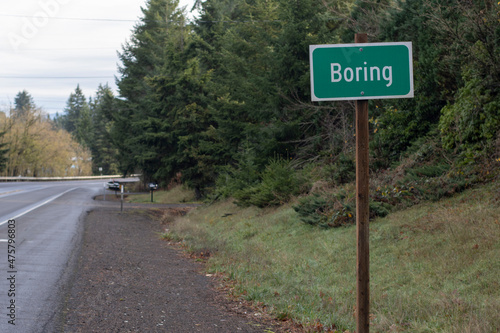 The city limit sign of Boring, Oregon, at the side of Highway 26. Boring (Oregon) and Dull (Scotland) became sister communities in 2012, united by unexciting names.