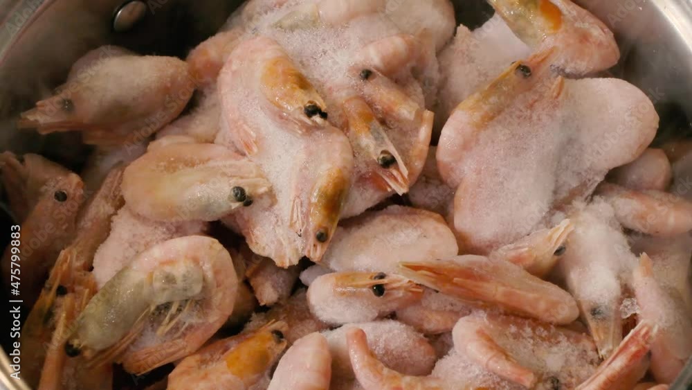 shrimps are thawed in a saucepan timelapse video shrimps are thawed in a saucepan timelapse video