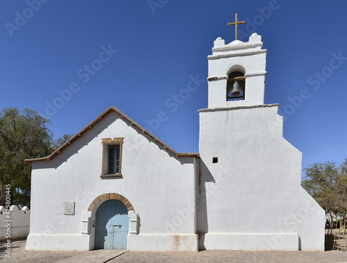 Exterior view of the Church of San Pedro de Atacama with a bell-cote, Chile photo