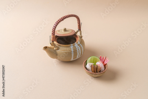 dobin mushi - steamed matsutake mushroom and pike conger with Japanese broth in an earthenware teapot. photo