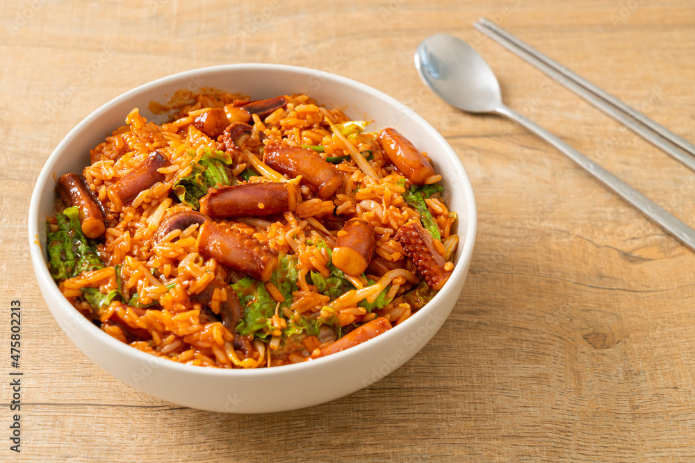 Stir-fried squid or octopus with Korean spicy sauce rice bowl Stir-fried squid or octopus with Korean spicy sauce rice bowl