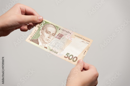 five hundreds hryvnias bill in hands