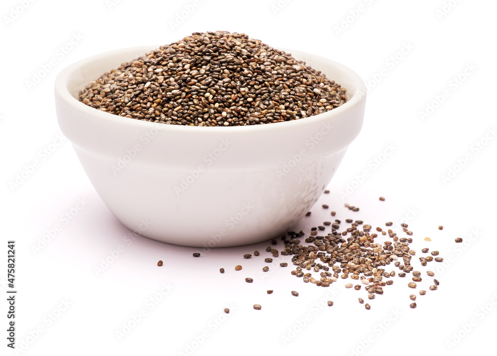 Ceramic bowl of organic natural chia seeds close-up isolated Ceramic bowl of organic natural chia seeds close-up isolated