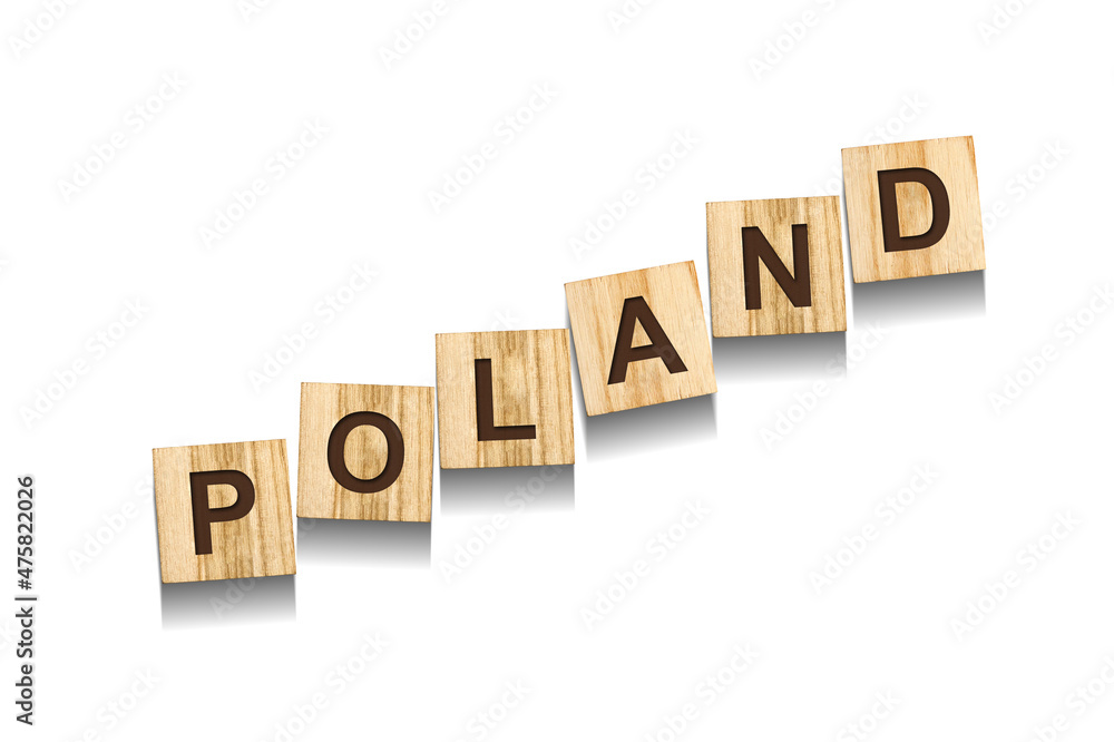 Poland, word on wooden blocks. Isolated on a white background. Poland, word on wooden blocks. Isolated on a white background.