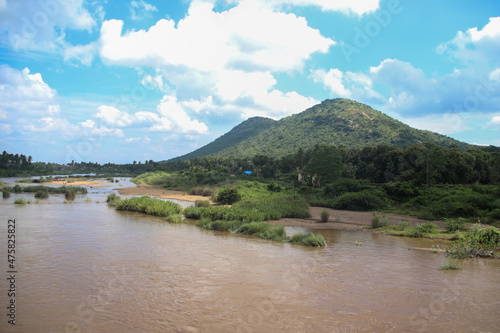 Greenish Landscape with mountain  river and clouds in south India  Tamil Nadu state  Dindigul district