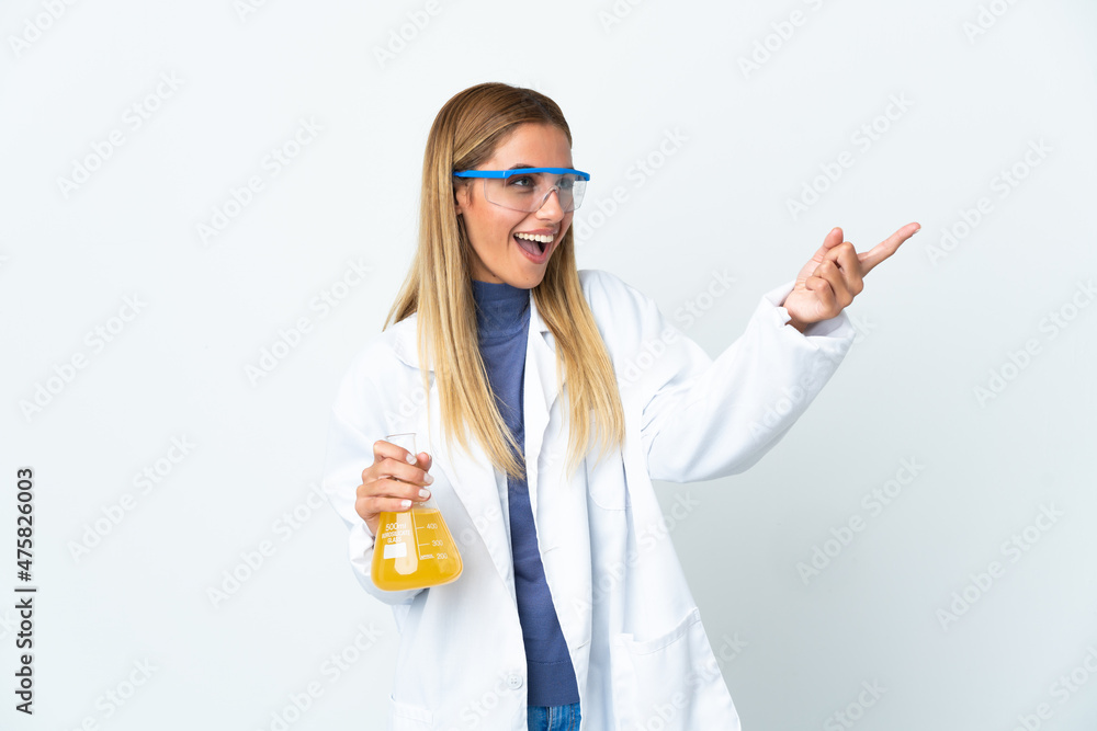 Young scientific woman isolated on white background pointing finger to the side and presenting a product Young scientific woman isolated on white background pointing finger to the side and presenting a product