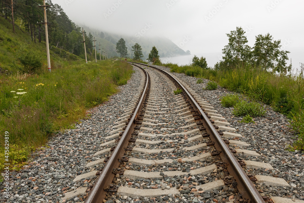 Circum-Baikal Railway. The railway is laid along the shore of Lake Baikal. Russia Circum-Baikal Railway. The railway is laid along the shore of Lake Baikal. Russia