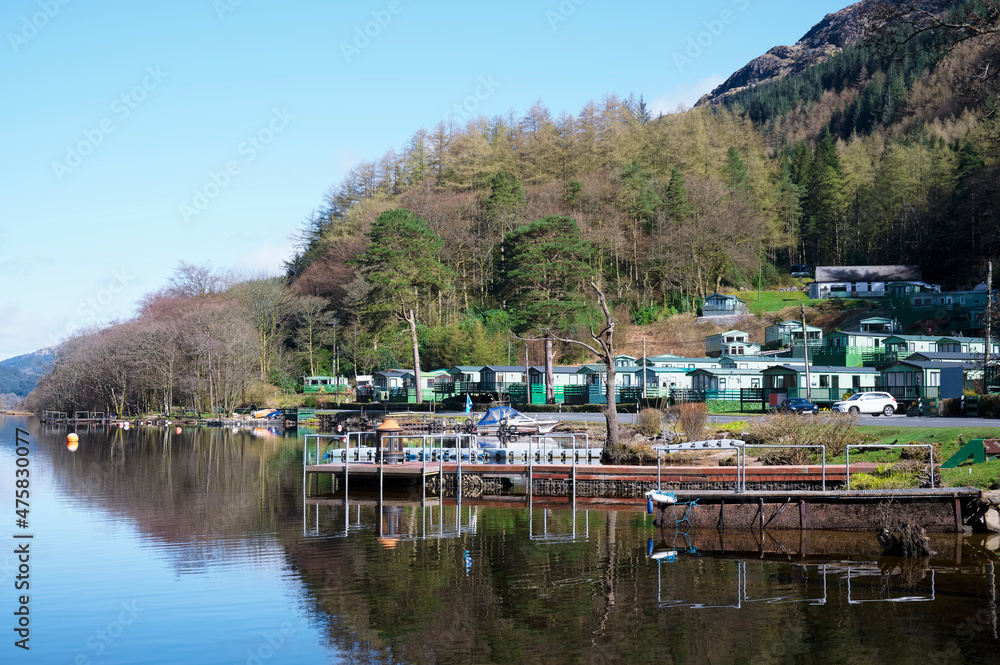 Obraz premium Caravan park by water at Loch Eck in Dunoon