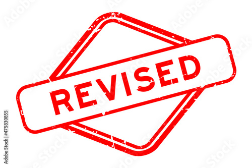 Grunge red revised word rubber seal stamp on white background