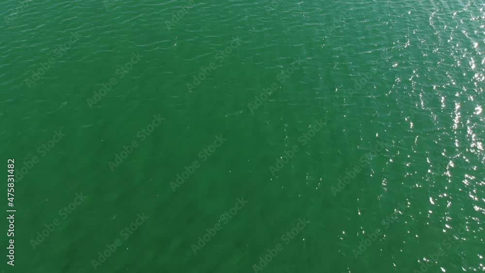 Aerial top view of turquoise water surface. Aerial view. Marine video background Aerial top view of turquoise water surface. Aerial view. Marine video background