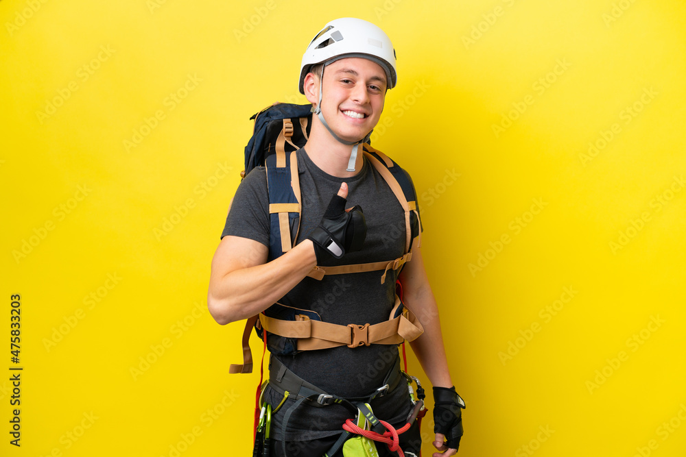 Young rock climber Brazilian man giving a thumbs up gesture Young rock climber Brazilian man giving a thumbs up gesture