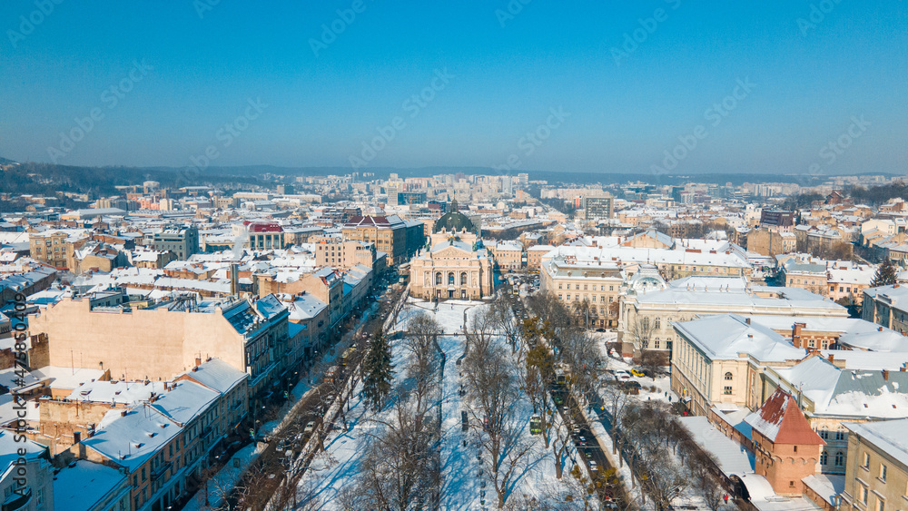 aerial view of city square in front of opera building in Lviv, sunny winter day aerial view of city square in front of opera building in Lviv, sunny winter day