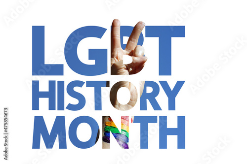 LGBT History Month modern concept, mixed media. Hand with victory gesture and drawn colorful rainbow. Clipped text and drawn flag of freedom symbol. photo