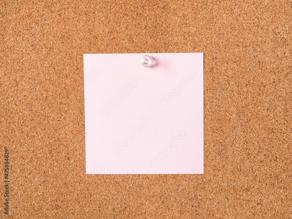 pink blank note paper pinned to cork board pink blank note paper pinned to cork board