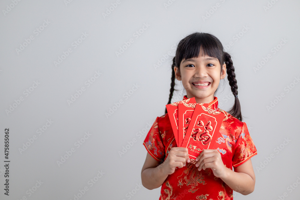 happy Chinese new year. smiling Asian little girls holding red envelope happy Chinese new year. smiling Asian little girls holding red envelope