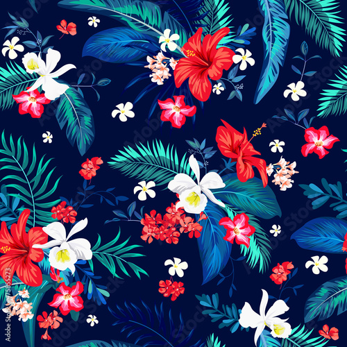 Seamless tropical motif with leaves and flowers