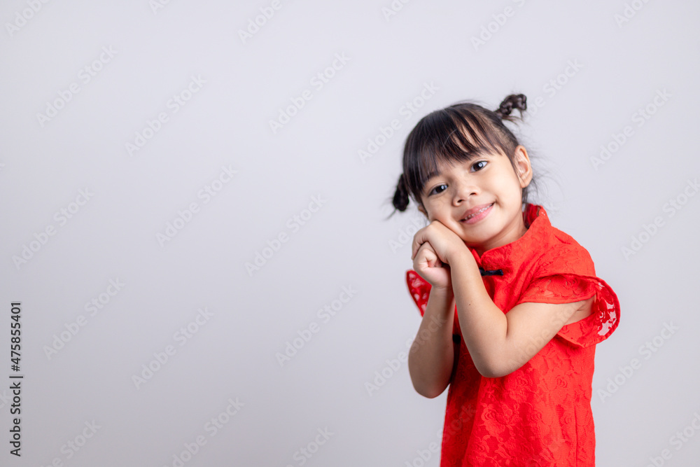 happy Chinese new year. Little Asian girls with Congratulation gesture happy Chinese new year. Little Asian girls with Congratulation gesture