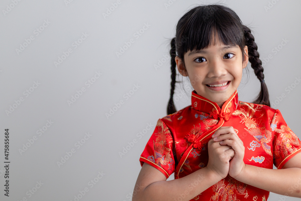 happy Chinese new year. Little Asian girls with Congratulation gesture happy Chinese new year. Little Asian girls with Congratulation gesture