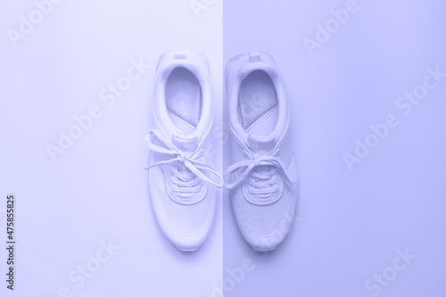 color of the Year 2022. Trendy gradient colors palette. Sneakers on lilac.