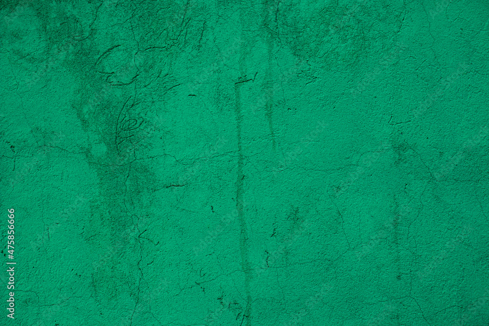 Background or texture of an old painted green grunge wall.
