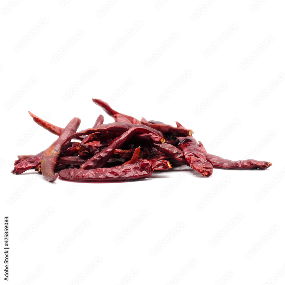 Pile of red dried chilli on white background. It's ingredient for Asian curry paste, chili sauce and many kind of sauce. Spot Focus. Pile of red dried chilli on white background. It's ingredient for Asian curry paste, chili sauce and many kind of sauce. Spot Focus.