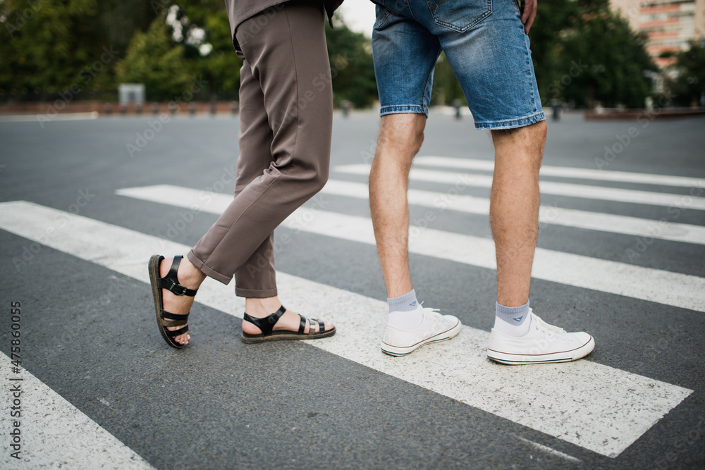 young couple in love holding hands and looking into the distance