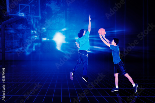 Two athletes playing basketball in the metaverse