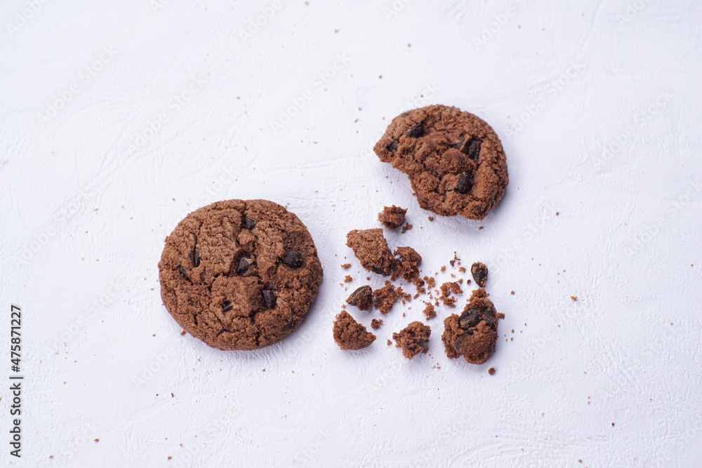 Chocolate cookies on a white table Chocolate cookies on a white table