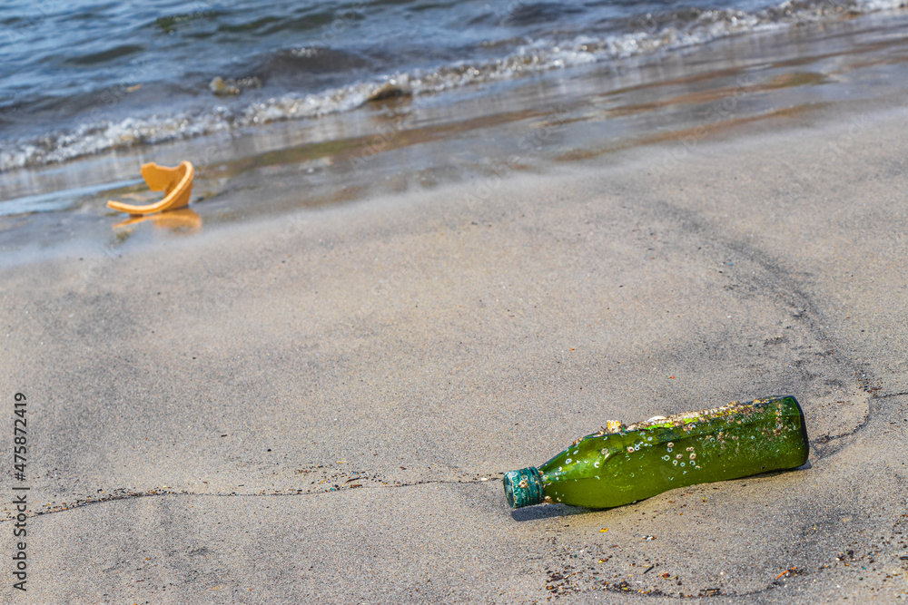 Plastic bottle stranded washed up garbage pollution on beach Brazil. Plastic bottle stranded washed up garbage pollution on beach Brazil.
