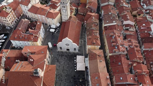 A 4K aerial footage of the Cathedral of Muggia in Italy photo