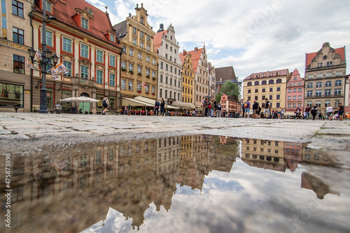 Wroclaw, Poland - due to the frequent rain, in Wroclaw you can easely find water pools, and use them to make nice shots. Here in particular the mirror effect in the Old Town