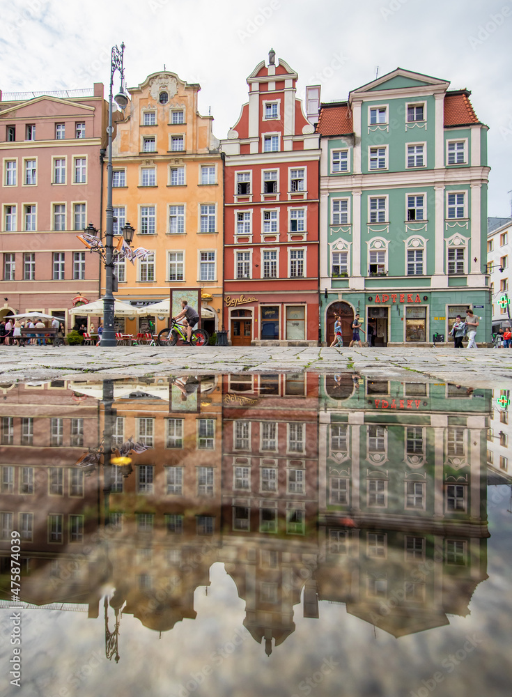 Wroclaw, Poland - due to the frequent rain, in Wroclaw you can easely find water pools, and use them to make nice shots. Here in particular the mirror effect in the Old Town