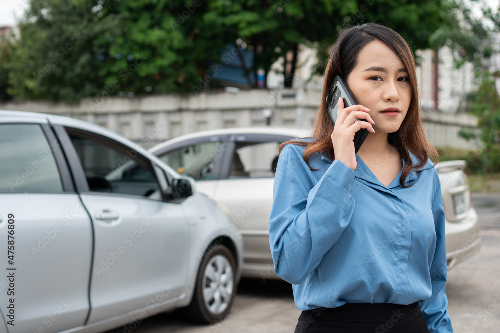 Woman drivers call insurance after a car accident before taking pictures and sending insurance. Online car accident insurance claim idea after submitting photos and evidence to an insurance company. Woman drivers call insurance after a car accident before taking pictures and sending insurance. Online car accident insurance claim idea after submitting photos and evidence to an insurance company.