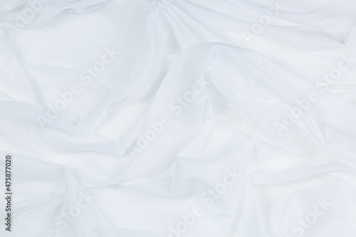 White cloth background abstract with soft waves,Closeup elegant crumpled of white silk fabric cloth background and texture. Luxury background design.