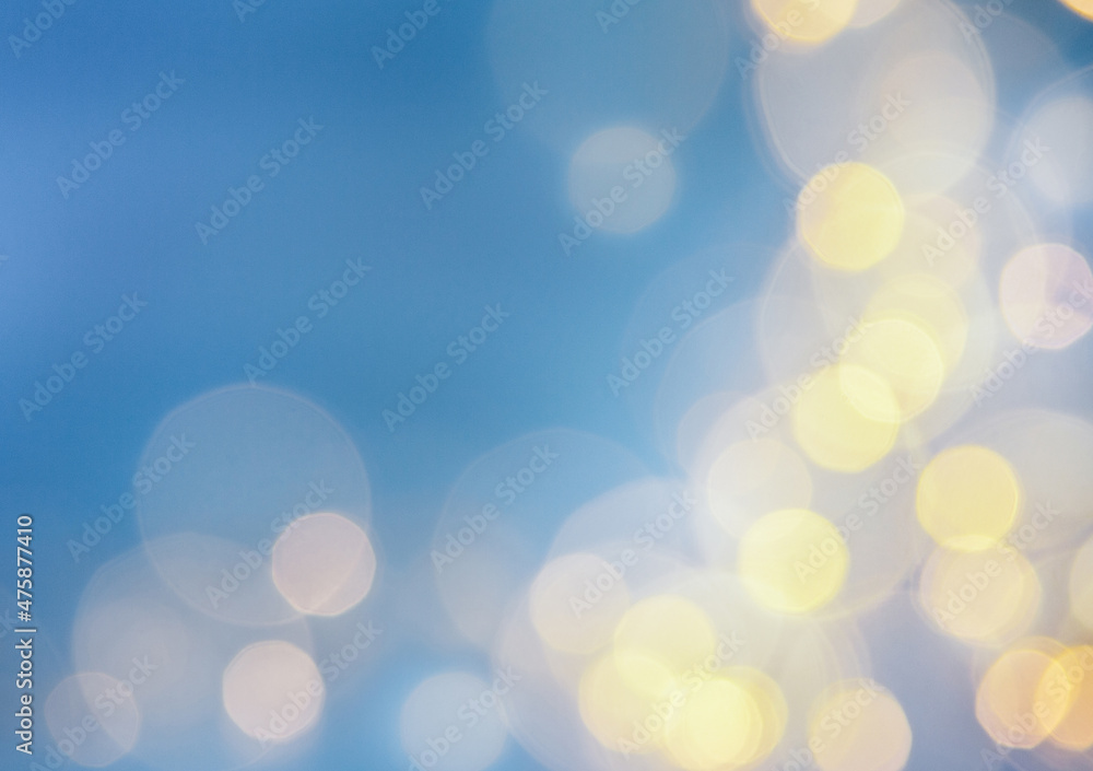 Fototapeta premium Blue background with defocused lights.