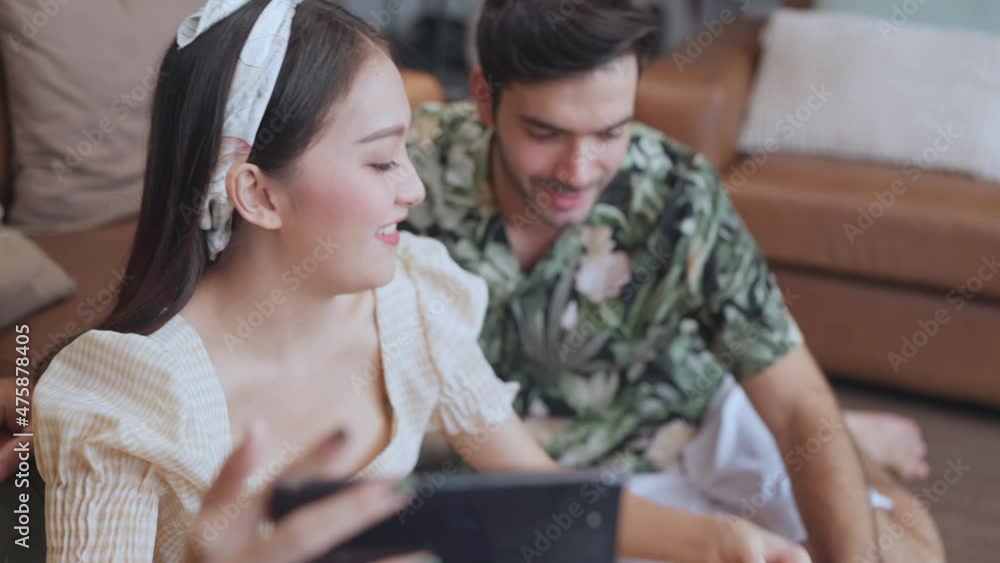 Happiness asian and caucasian couple ready to go abroad travel,marry cheerful couple enjoy selfie photo together using smartphone while packing cloth lugguge stuff for traveling after covid over Happiness asian and caucasian couple ready to go abroad travel,marry cheerful couple enjoy selfie photo together using smartphone while packing cloth lugguge stuff for traveling after covid over