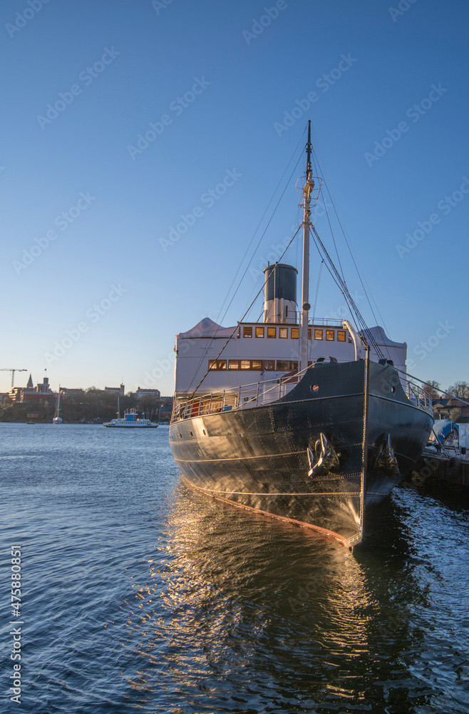 Old preserved ice breaker ship at a pier a sunny winter day in Stockholm