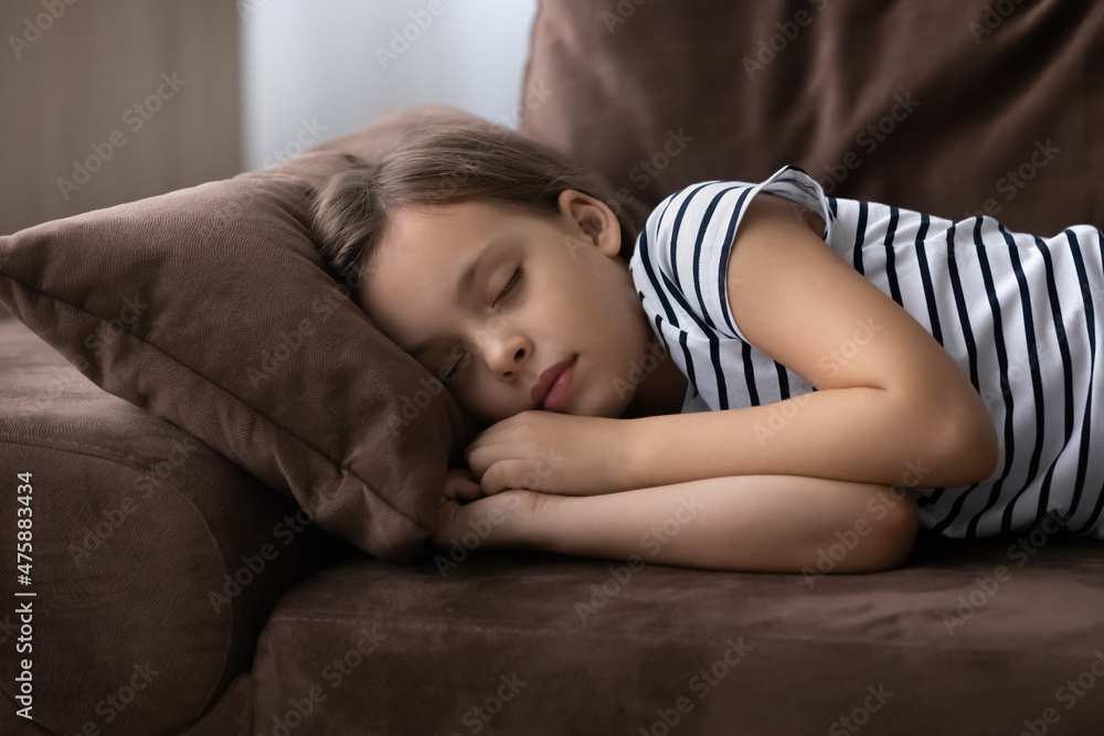 Sweet dreams. Cute little preteen girl sleep dream nap on cozy couch ...