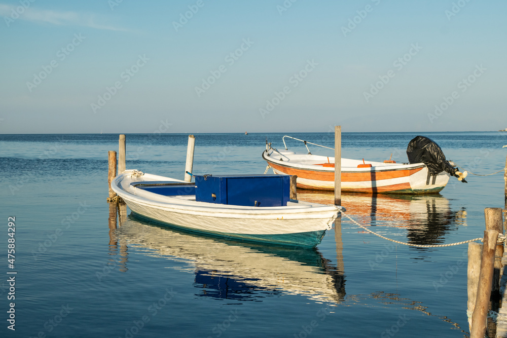 Moored fishing boat at lagoon in Greece