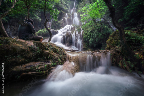 Erawan waterfall is the beautiful wild watefall in the deep rain forest of the national park in Kanchanaburi in Thailand