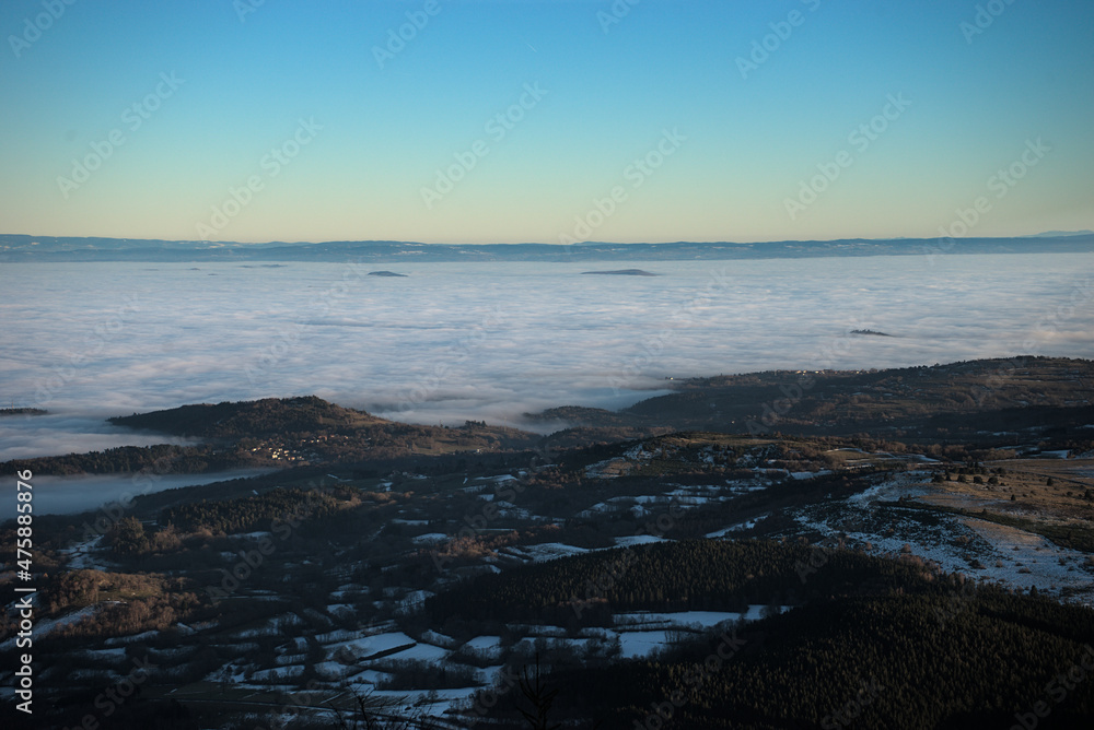 sea ​​of ​​clouds on the Auvergne volcanic chain in Puy-de-Dome in winter