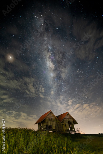 A coulple house under the Milky way