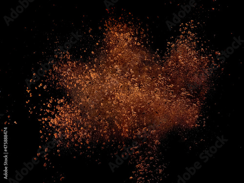 Canvas Print Explosion of dry instant coffee on black background